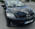 Черный Мазда СХ-7, объемом двигателя 2.3 л и пробегом 137 тыс. км за 8000 $, фото 1 на Automoto.ua