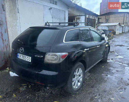 Чорний Мазда СХ-7, об'ємом двигуна 2.26 л та пробігом 200 тис. км за 2990 $, фото 1 на Automoto.ua
