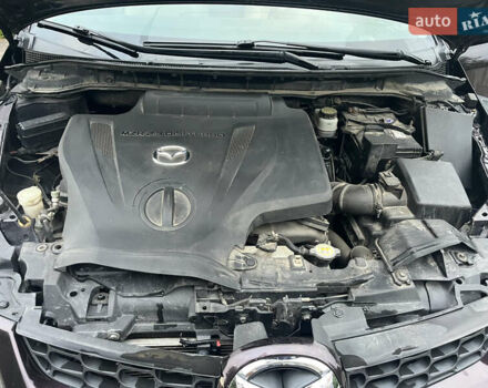 Черный Мазда СХ-7, объемом двигателя 2.26 л и пробегом 140 тыс. км за 6000 $, фото 23 на Automoto.ua