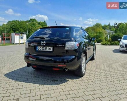 Черный Мазда СХ-7, объемом двигателя 2.26 л и пробегом 145 тыс. км за 7800 $, фото 2 на Automoto.ua