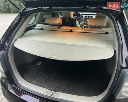 Черный Мазда СХ-7, объемом двигателя 2.26 л и пробегом 140 тыс. км за 6000 $, фото 12 на Automoto.ua