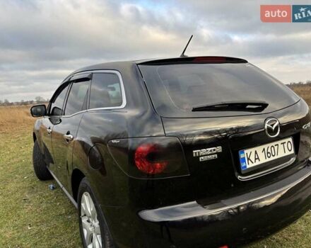 Черный Мазда СХ-7, объемом двигателя 2.26 л и пробегом 220 тыс. км за 7950 $, фото 42 на Automoto.ua