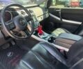Черный Мазда СХ-7, объемом двигателя 2.3 л и пробегом 180 тыс. км за 5600 $, фото 12 на Automoto.ua