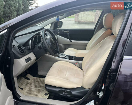 Черный Мазда СХ-7, объемом двигателя 2.26 л и пробегом 140 тыс. км за 6000 $, фото 18 на Automoto.ua