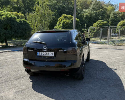 Чорний Мазда СХ-7, об'ємом двигуна 2.3 л та пробігом 185 тис. км за 5500 $, фото 9 на Automoto.ua