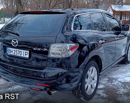 Черный Мазда СХ-7, объемом двигателя 2.3 л и пробегом 140 тыс. км за 7000 $, фото 5 на Automoto.ua