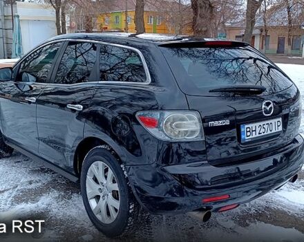 Черный Мазда СХ-7, объемом двигателя 2.3 л и пробегом 140 тыс. км за 7000 $, фото 4 на Automoto.ua