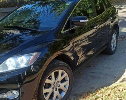 Черный Мазда СХ-7, объемом двигателя 2.26 л и пробегом 143 тыс. км за 7500 $, фото 1 на Automoto.ua