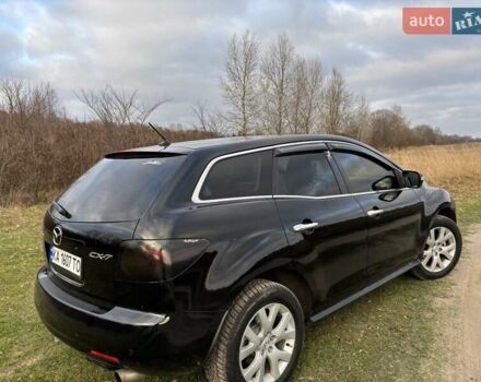 Черный Мазда СХ-7, объемом двигателя 2.26 л и пробегом 220 тыс. км за 7950 $, фото 17 на Automoto.ua