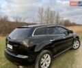 Черный Мазда СХ-7, объемом двигателя 2.26 л и пробегом 220 тыс. км за 7950 $, фото 17 на Automoto.ua
