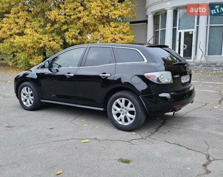 Черный Мазда СХ-7, объемом двигателя 2.26 л и пробегом 205 тыс. км за 5500 $, фото 1 на Automoto.ua