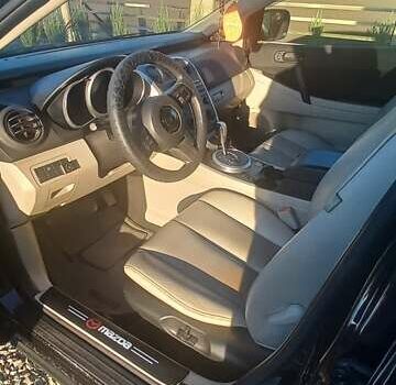 Черный Мазда СХ-7, объемом двигателя 2.26 л и пробегом 150 тыс. км за 6800 $, фото 7 на Automoto.ua