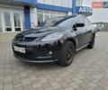 Черный Мазда СХ-7, объемом двигателя 2.3 л и пробегом 175 тыс. км за 4999 $, фото 2 на Automoto.ua