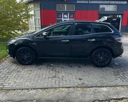 Черный Мазда СХ-7, объемом двигателя 2.26 л и пробегом 196 тыс. км за 7600 $, фото 3 на Automoto.ua