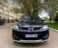 Черный Мазда СХ-7, объемом двигателя 2.3 л и пробегом 104 тыс. км за 4200 $, фото 1 на Automoto.ua