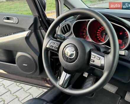 Черный Мазда СХ-7, объемом двигателя 2.3 л и пробегом 124 тыс. км за 7800 $, фото 61 на Automoto.ua