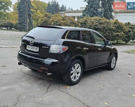 Черный Мазда СХ-7, объемом двигателя 2.26 л и пробегом 205 тыс. км за 5500 $, фото 4 на Automoto.ua