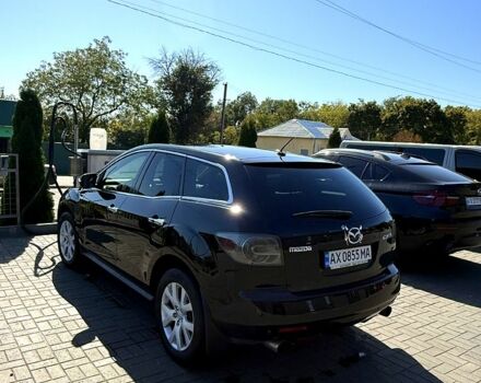 Черный Мазда СХ-7, объемом двигателя 2.3 л и пробегом 288 тыс. км за 8500 $, фото 1 на Automoto.ua
