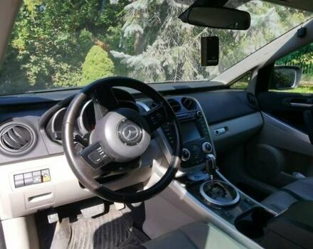 Черный Мазда СХ-7, объемом двигателя 2.26 л и пробегом 230 тыс. км за 6100 $, фото 1 на Automoto.ua