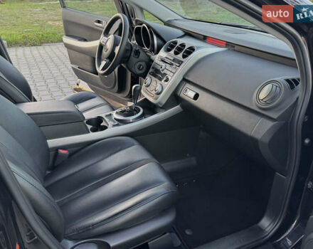 Черный Мазда СХ-7, объемом двигателя 2.3 л и пробегом 124 тыс. км за 7800 $, фото 56 на Automoto.ua