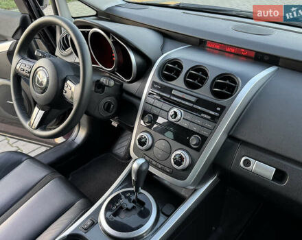 Черный Мазда СХ-7, объемом двигателя 2.3 л и пробегом 124 тыс. км за 7800 $, фото 60 на Automoto.ua