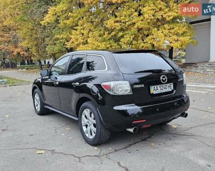 Черный Мазда СХ-7, объемом двигателя 2.26 л и пробегом 205 тыс. км за 5500 $, фото 8 на Automoto.ua