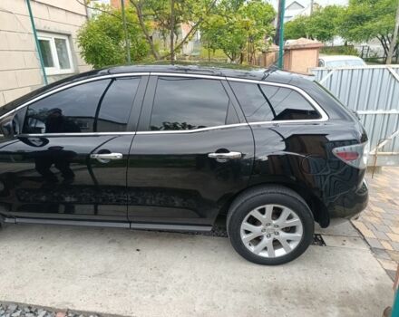 Черный Мазда СХ-7, объемом двигателя 2.3 л и пробегом 150 тыс. км за 7200 $, фото 1 на Automoto.ua