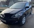 Черный Мазда СХ-7, объемом двигателя 3.2 л и пробегом 210 тыс. км за 7300 $, фото 1 на Automoto.ua