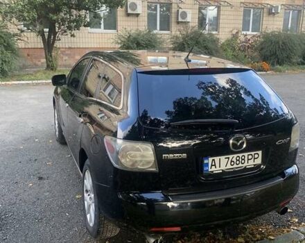 Черный Мазда СХ-7, объемом двигателя 2.3 л и пробегом 117 тыс. км за 6400 $, фото 3 на Automoto.ua