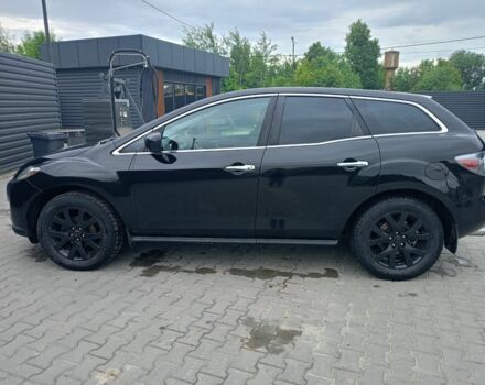 Черный Мазда СХ-7, объемом двигателя 2.3 л и пробегом 180 тыс. км за 6600 $, фото 1 на Automoto.ua