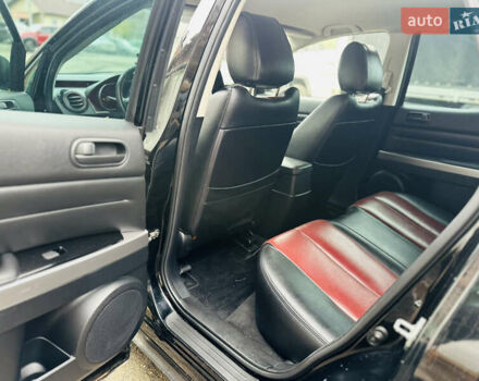 Черный Мазда СХ-7, объемом двигателя 2.49 л и пробегом 169 тыс. км за 5700 $, фото 4 на Automoto.ua