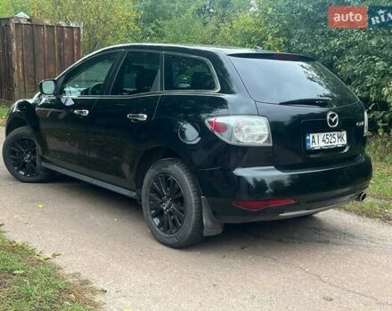 Черный Мазда СХ-7, объемом двигателя 2.49 л и пробегом 260 тыс. км за 9000 $, фото 3 на Automoto.ua