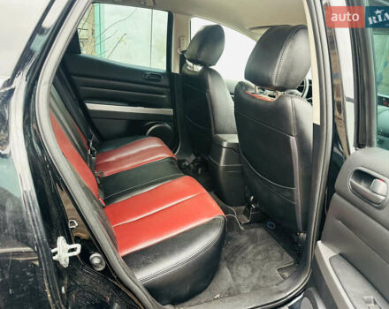 Черный Мазда СХ-7, объемом двигателя 2.49 л и пробегом 169 тыс. км за 5700 $, фото 2 на Automoto.ua