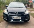 Черный Мазда СХ-7, объемом двигателя 2.49 л и пробегом 260 тыс. км за 9000 $, фото 1 на Automoto.ua