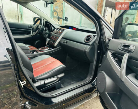 Черный Мазда СХ-7, объемом двигателя 2.49 л и пробегом 169 тыс. км за 5700 $, фото 3 на Automoto.ua
