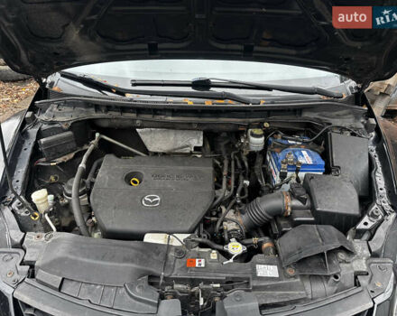 Черный Мазда СХ-7, объемом двигателя 2.49 л и пробегом 169 тыс. км за 5700 $, фото 1 на Automoto.ua