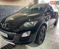 Черный Мазда СХ-7, объемом двигателя 2.2 л и пробегом 384 тыс. км за 11700 $, фото 1 на Automoto.ua