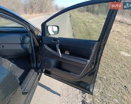 Черный Мазда СХ-7, объемом двигателя 2.2 л и пробегом 215 тыс. км за 10500 $, фото 13 на Automoto.ua
