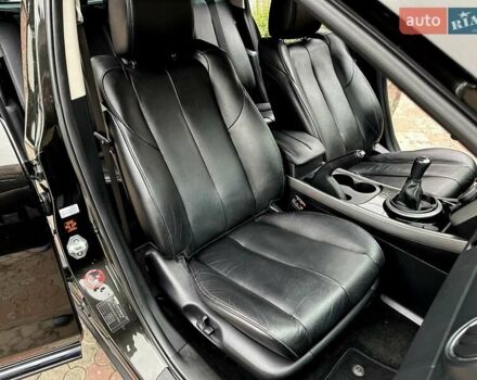 Чорний Мазда СХ-7, об'ємом двигуна 2.2 л та пробігом 249 тис. км за 10500 $, фото 42 на Automoto.ua