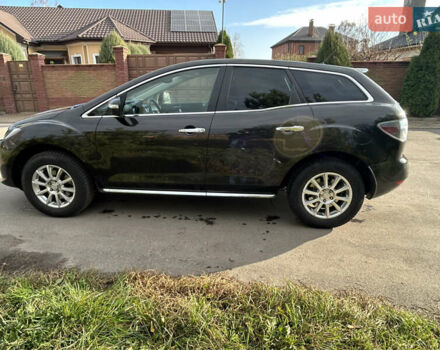 Черный Мазда СХ-7, объемом двигателя 2.2 л и пробегом 211 тыс. км за 9950 $, фото 6 на Automoto.ua