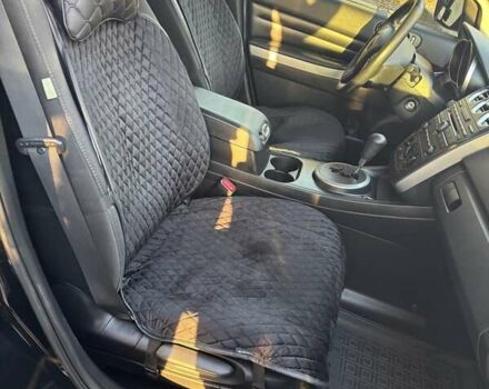 Чорний Мазда СХ-7, об'ємом двигуна 2.49 л та пробігом 290 тис. км за 9800 $, фото 17 на Automoto.ua