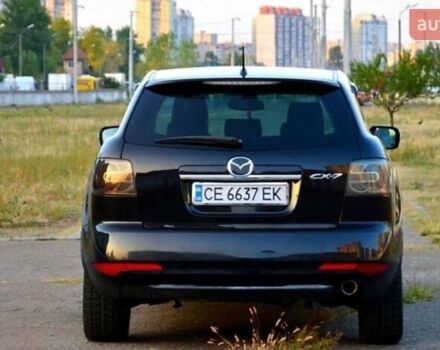Черный Мазда СХ-7, объемом двигателя 2.2 л и пробегом 304 тыс. км за 9100 $, фото 1 на Automoto.ua