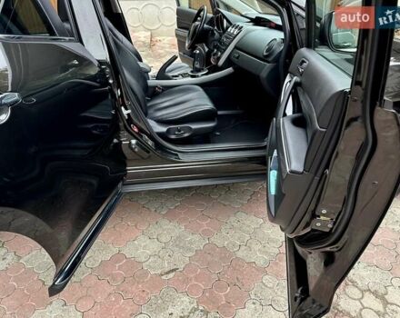 Чорний Мазда СХ-7, об'ємом двигуна 2.2 л та пробігом 249 тис. км за 10500 $, фото 41 на Automoto.ua