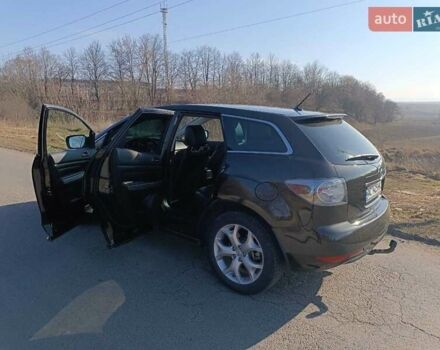 Черный Мазда СХ-7, объемом двигателя 2.2 л и пробегом 225 тыс. км за 9950 $, фото 21 на Automoto.ua