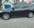 Черный Мазда СХ-7, объемом двигателя 2.5 л и пробегом 271 тыс. км за 11000 $, фото 1 на Automoto.ua