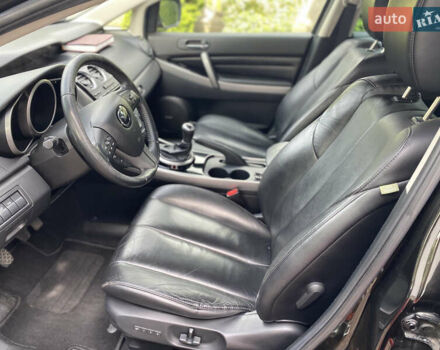 Черный Мазда СХ-7, объемом двигателя 2.2 л и пробегом 132 тыс. км за 11200 $, фото 2 на Automoto.ua