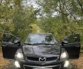 Черный Мазда СХ-7, объемом двигателя 2.2 л и пробегом 240 тыс. км за 11000 $, фото 6 на Automoto.ua