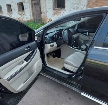 Чорний Мазда СХ-7, об'ємом двигуна 2.2 л та пробігом 211 тис. км за 13000 $, фото 6 на Automoto.ua