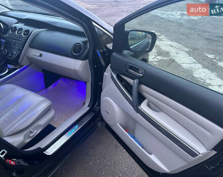 Черный Мазда СХ-7, объемом двигателя 2.2 л и пробегом 245 тыс. км за 10200 $, фото 6 на Automoto.ua