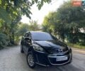 Черный Мазда СХ-7, объемом двигателя 2.5 л и пробегом 256 тыс. км за 10500 $, фото 1 на Automoto.ua